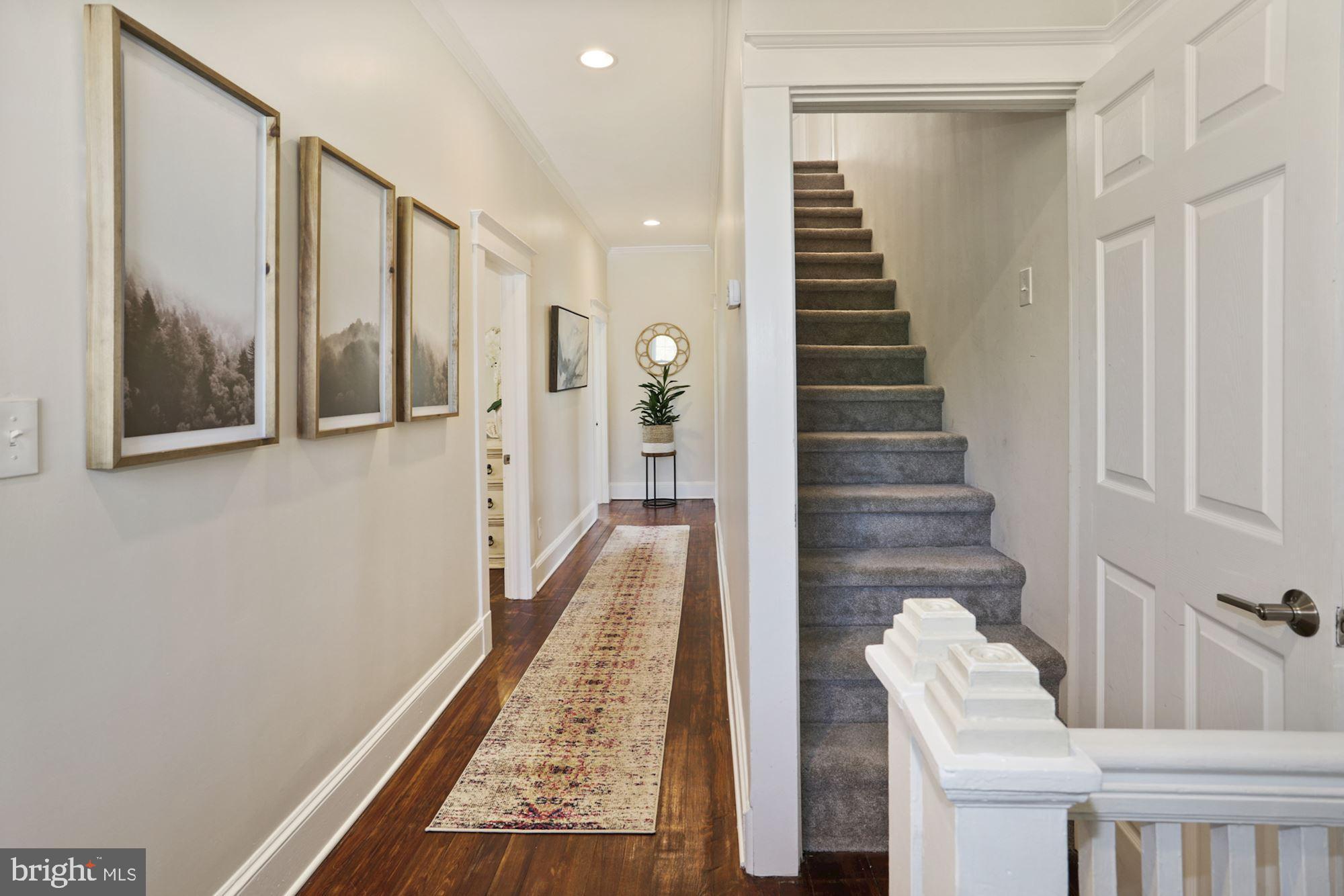 372 Forest Beach Road Annapolis, MD 21409 - Photo 19 of 49 2nd Floor Hall & Stairs to Master