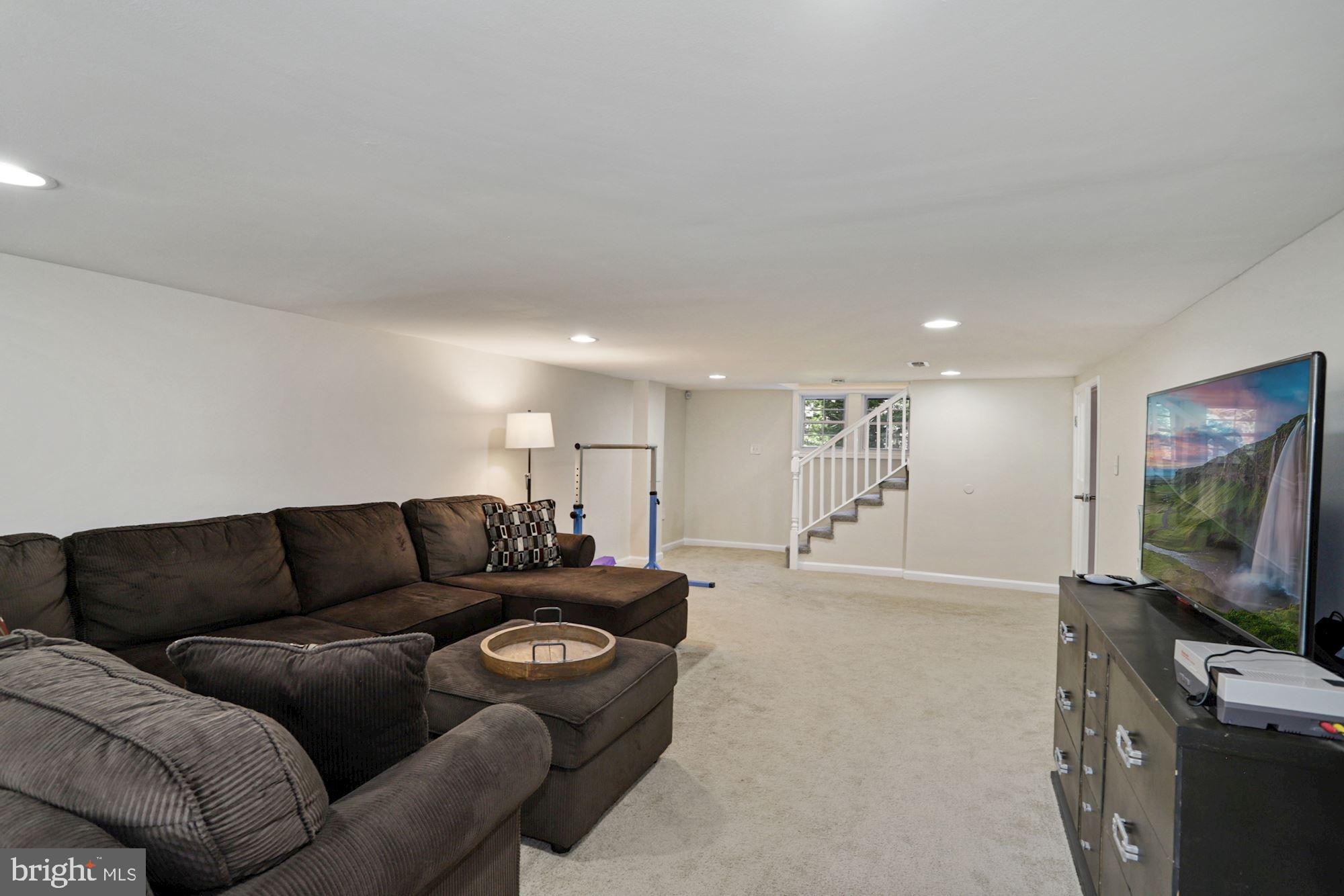 372 Forest Beach Road Annapolis, MD 21409 - Photo 34 of 49 Basement with ample storage in unfinished area.