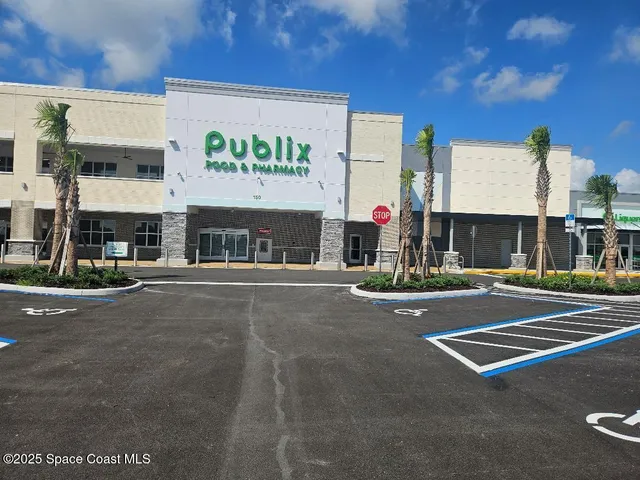 a view of a park with welcome board
