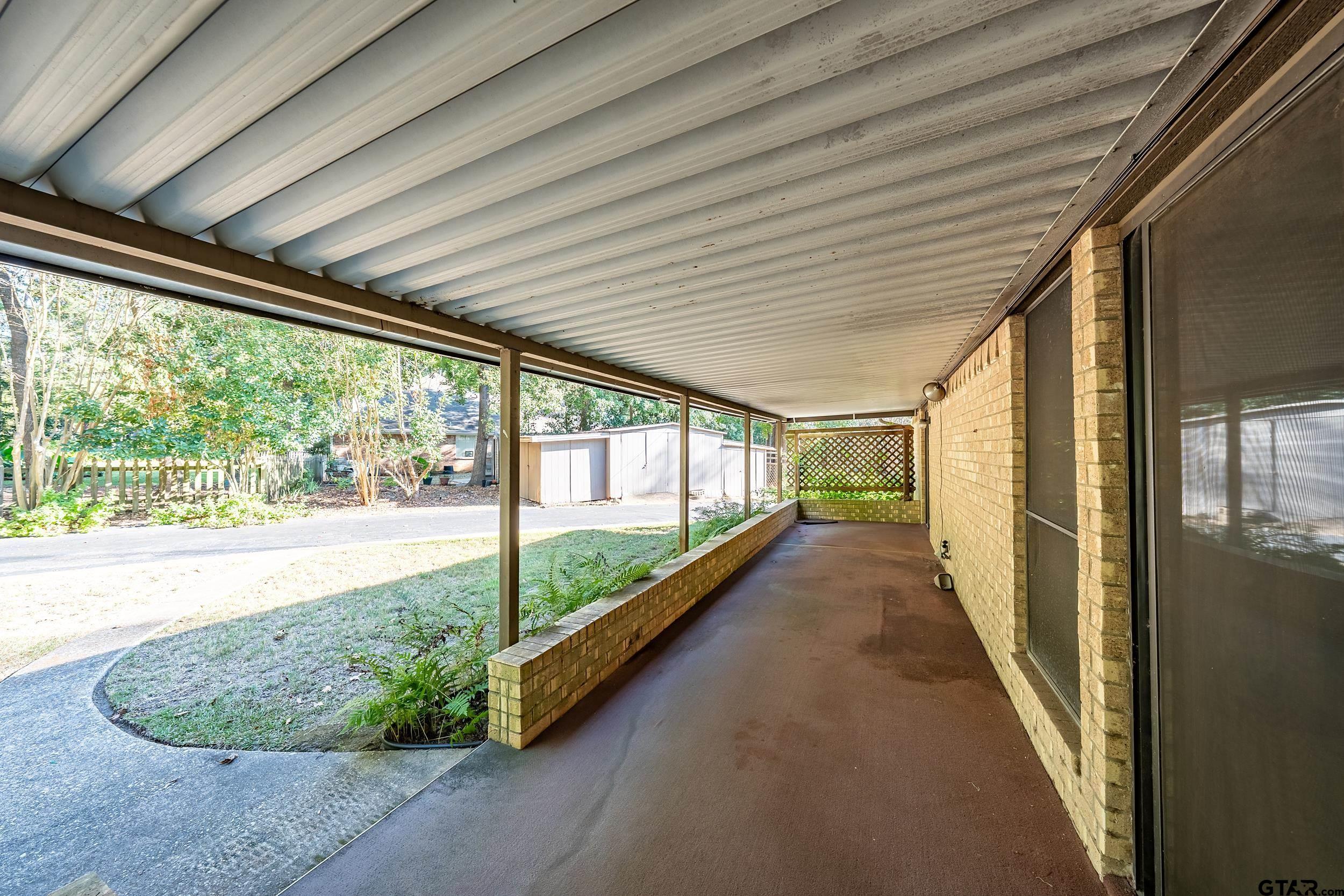 331 Bent Horseshoe Lane Holly Lake Ranch, TX 75765 - Photo 15 of 44 a view of porch with seating space
