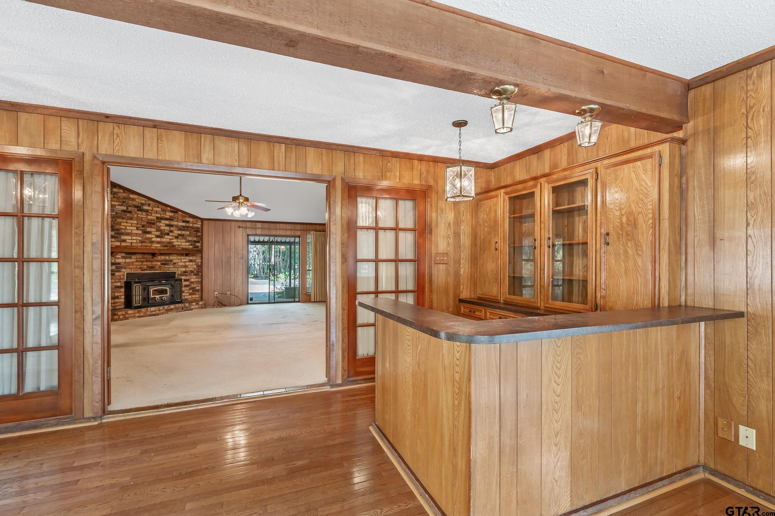 331 Bent Horseshoe Lane Holly Lake Ranch, TX 75765 - Photo 20 of 44 wooden floor in an empty room