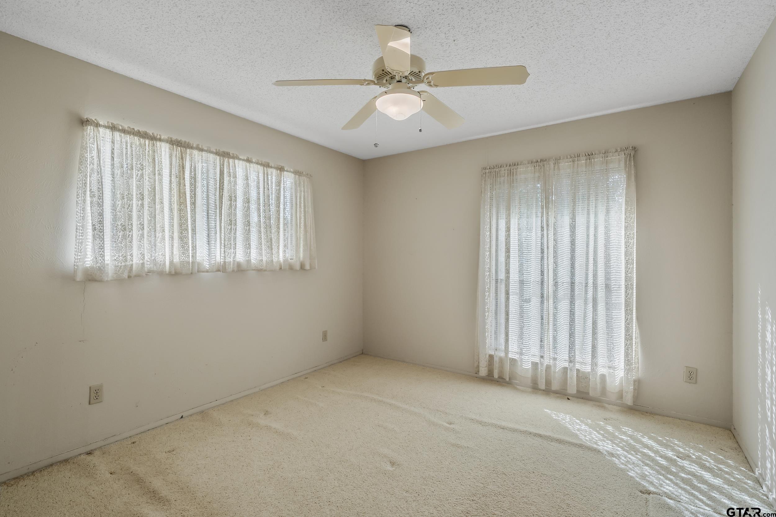 331 Bent Horseshoe Lane Holly Lake Ranch, TX 75765 - Photo 33 of 44 a view of an empty room with a window