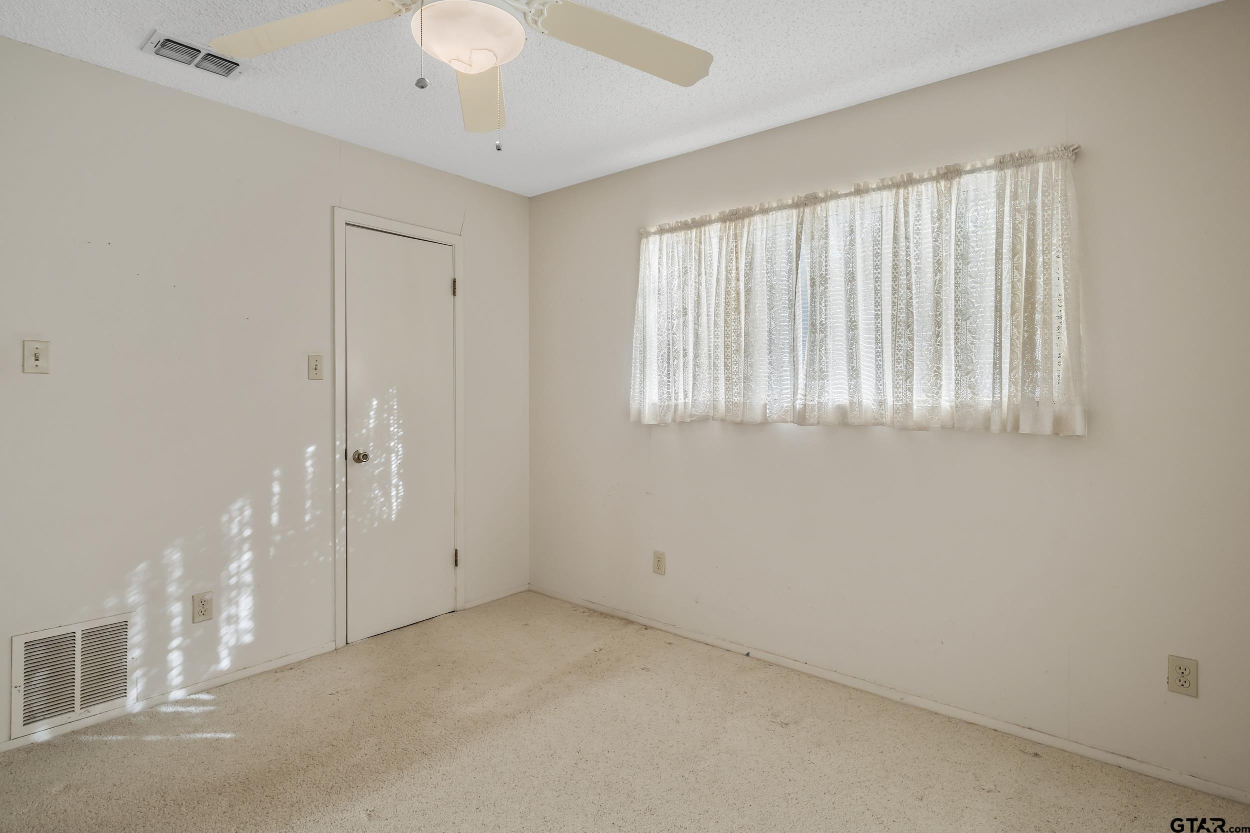 331 Bent Horseshoe Lane Holly Lake Ranch, TX 75765 - Photo 34 of 44 a view of an empty room with a window
