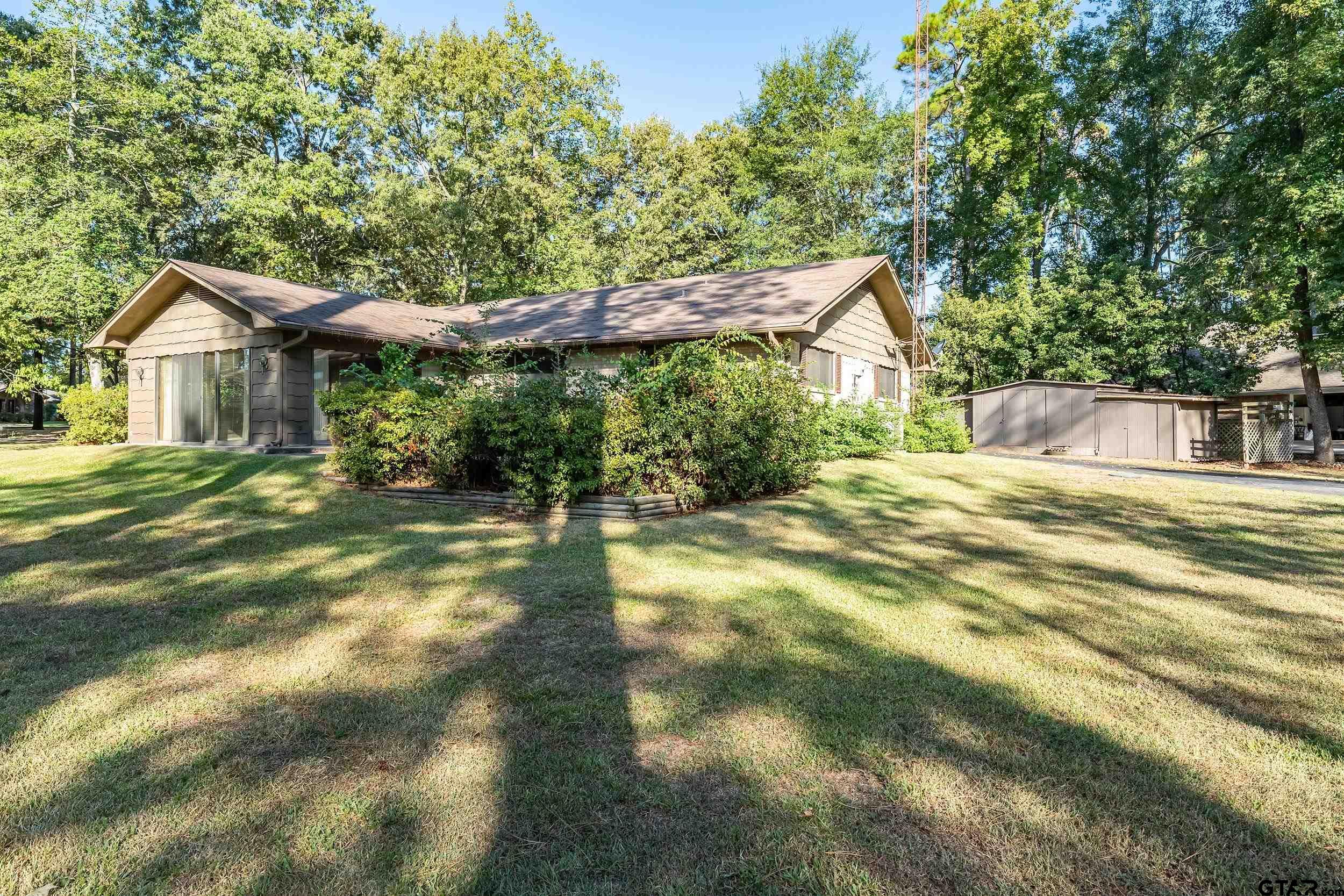 331 Bent Horseshoe Lane Holly Lake Ranch, TX 75765 - Photo 4 of 44 a house view with a garden space