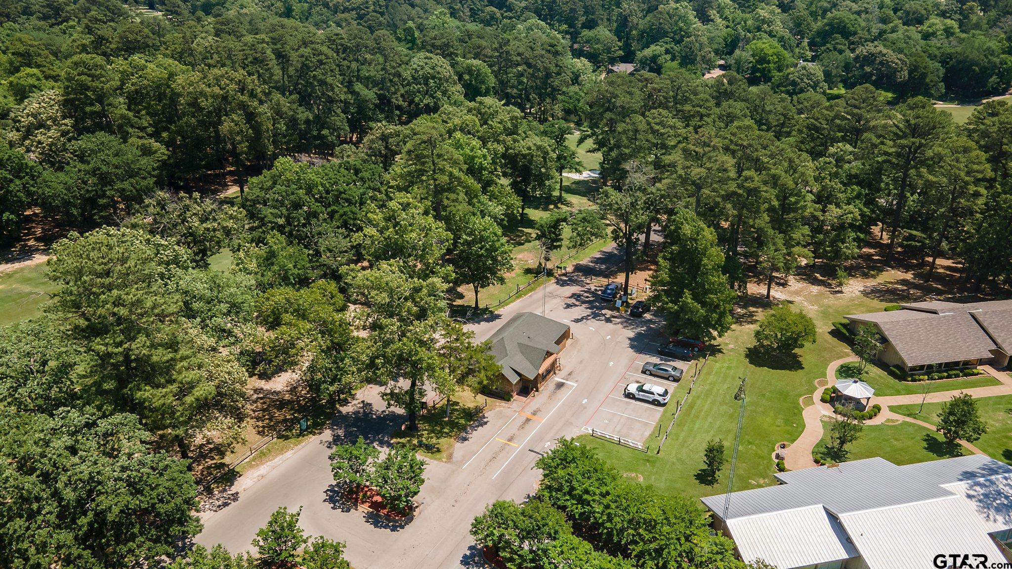 331 Bent Horseshoe Lane Holly Lake Ranch, TX 75765 - Photo 41 of 44 an aerial view of residential house with outdoor space and trees all around