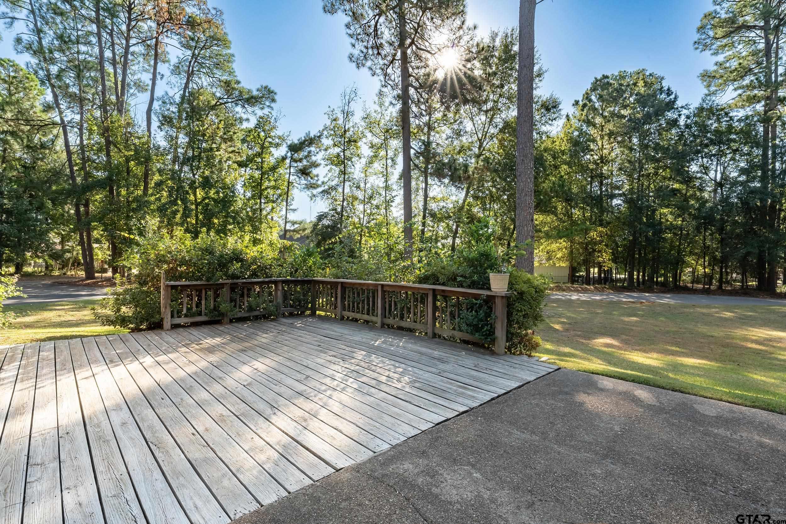 331 Bent Horseshoe Lane Holly Lake Ranch, TX 75765 - Photo 9 of 44 a view of swimming pool with trees in the background