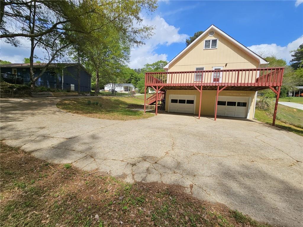 846 Idlewood Road Winder, GA 30680 - Photo 25 of 27 a view of a large house with a yard