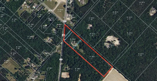 a picture of outdoor space with wooden floor and stairs