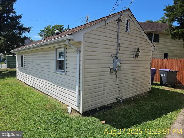 a view of a back yard of the house