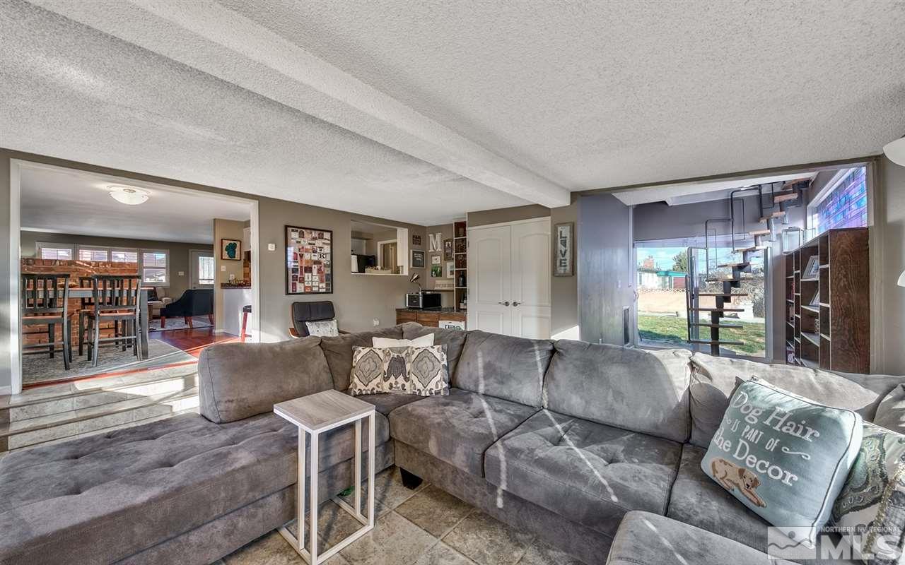 1690 West 6th Street Reno, NV 89503 - Photo 14 of 25 a living room with furniture and a flat screen tv