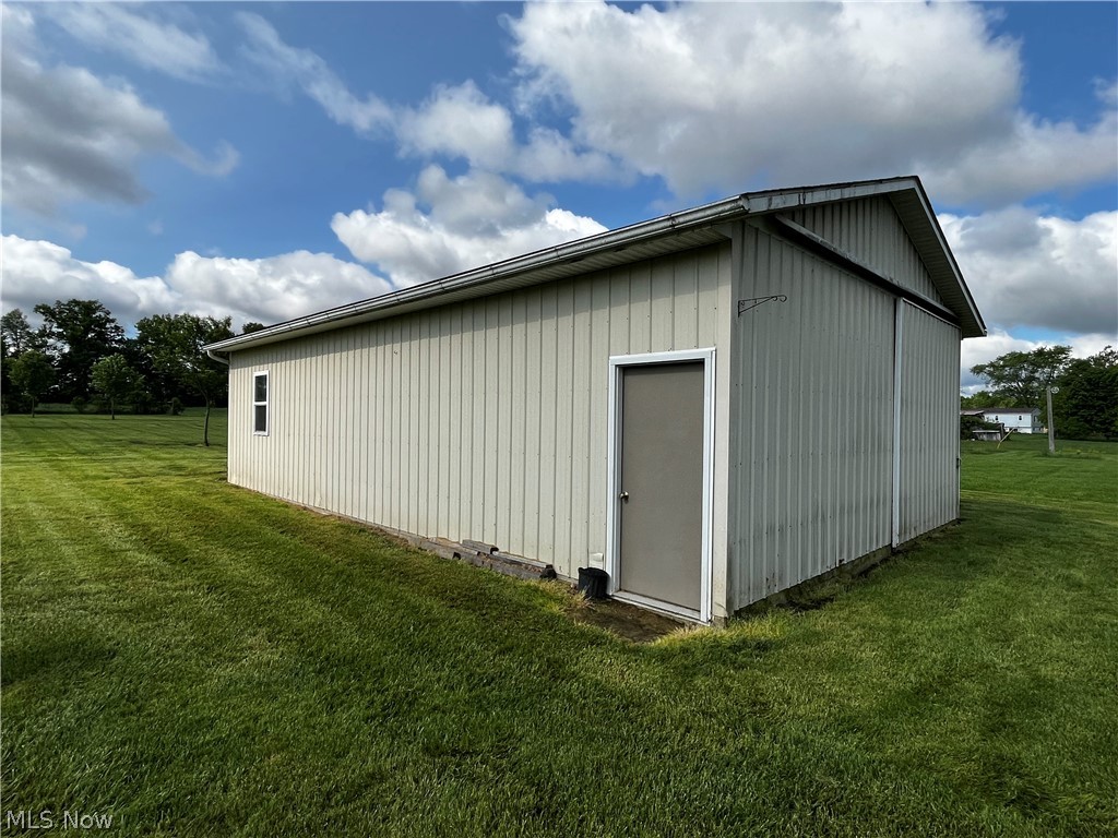 6876 Clark Road Atwater, OH 44201 - Photo 29 of 41 View of shed / structure with a lawn
