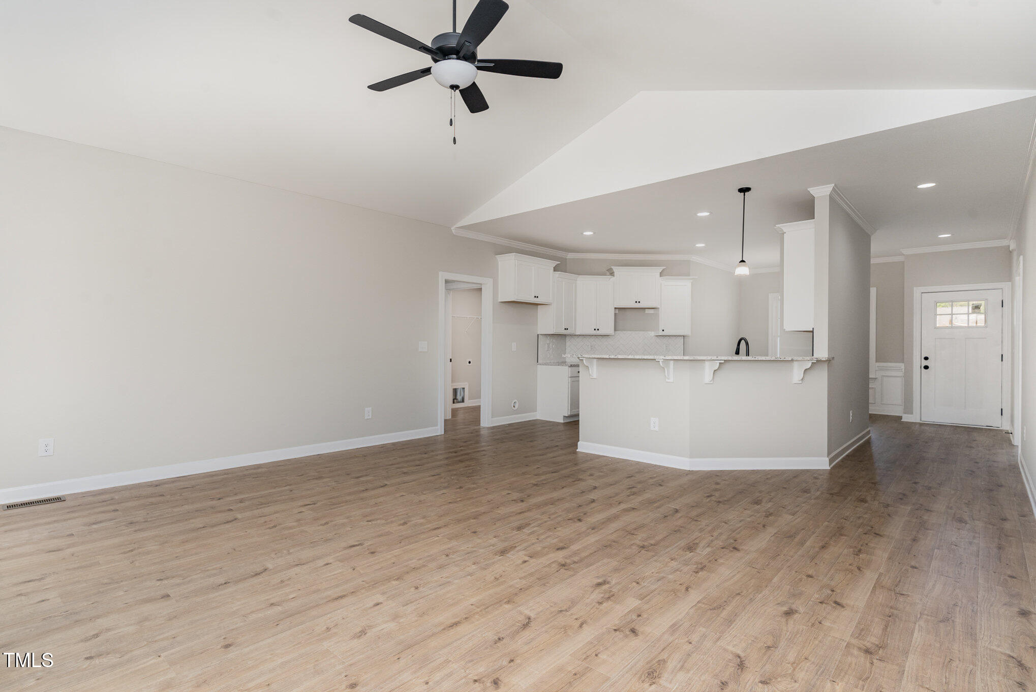 30 Tee Drive Selma, NC 27576 - Photo 12 of 28 a view of a kitchen with a sink and wooden floor