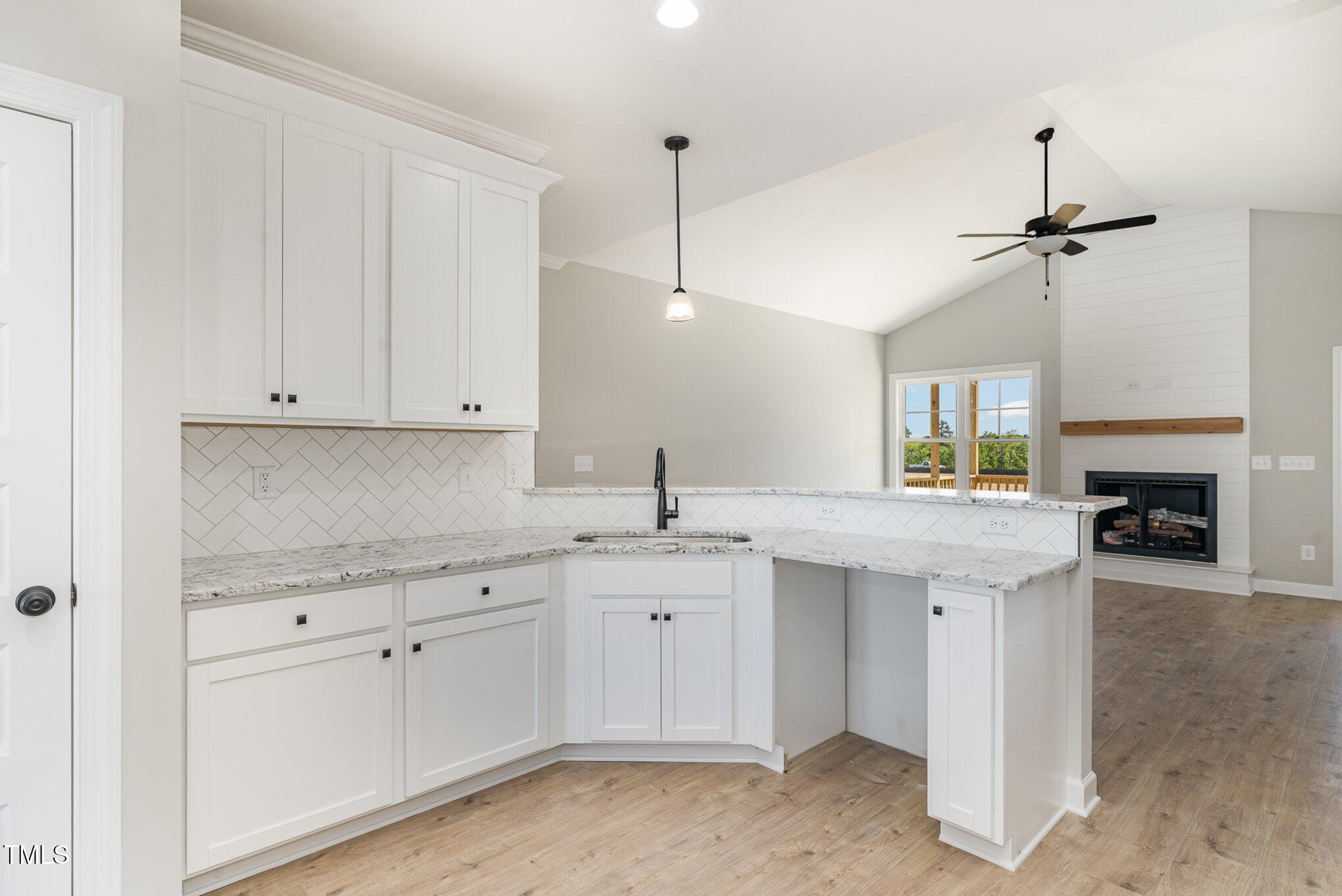 30 Tee Drive Selma, NC 27576 - Photo 13 of 28 a kitchen with a sink and cabinets