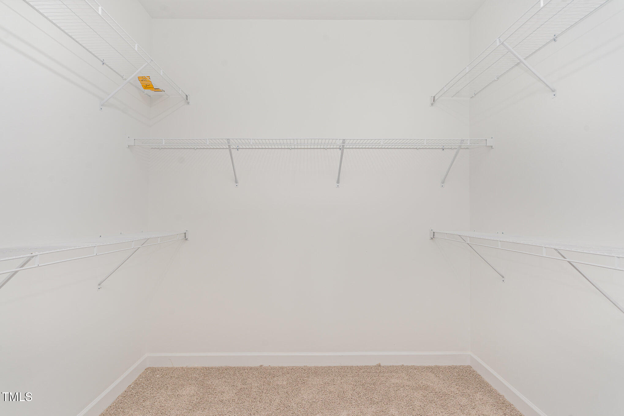 30 Tee Drive Selma, NC 27576 - Photo 21 of 28 a view of a room with racks on the wall