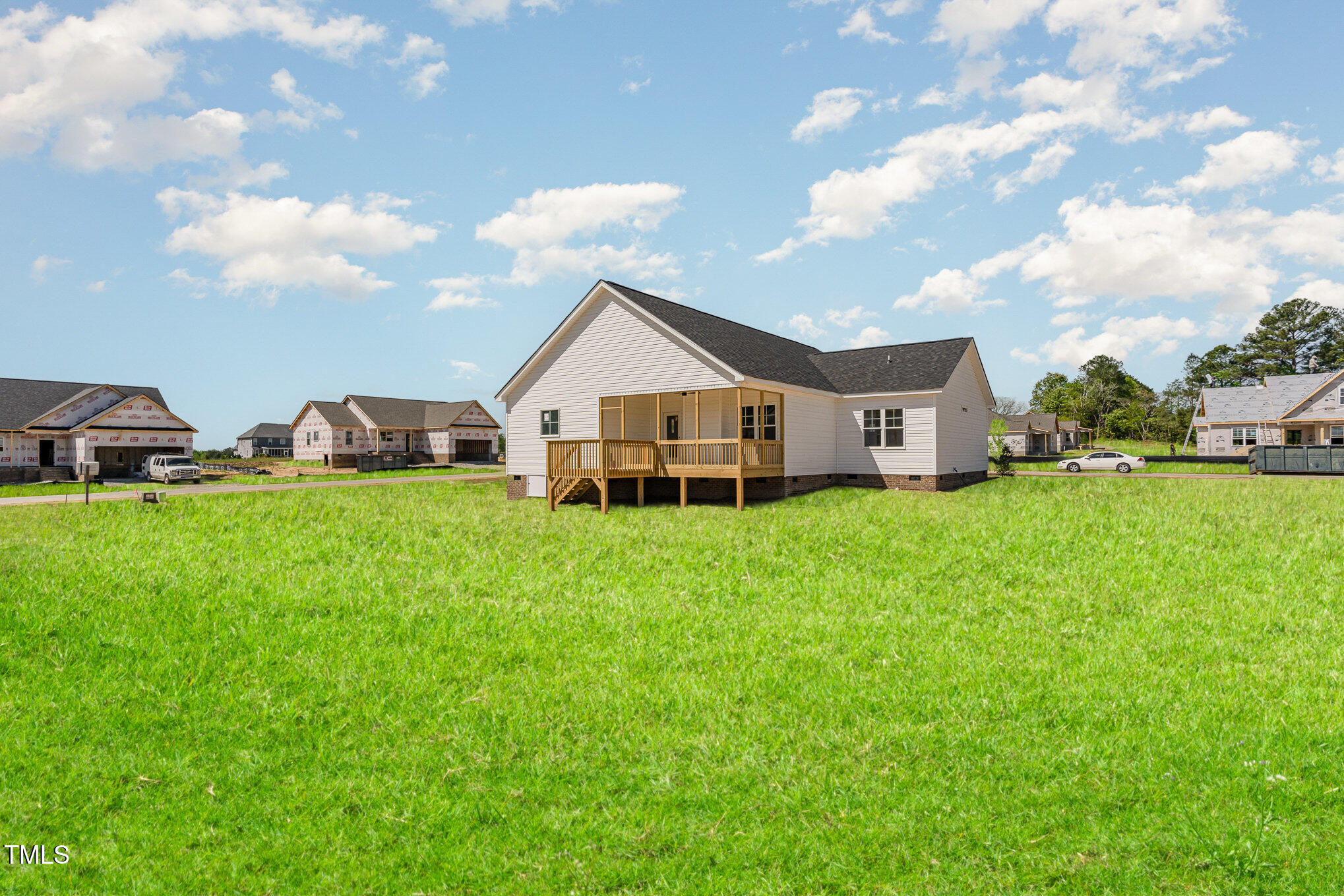 30 Tee Drive Selma, NC 27576 - Photo 28 of 28 a view of an house with backyard space and garden