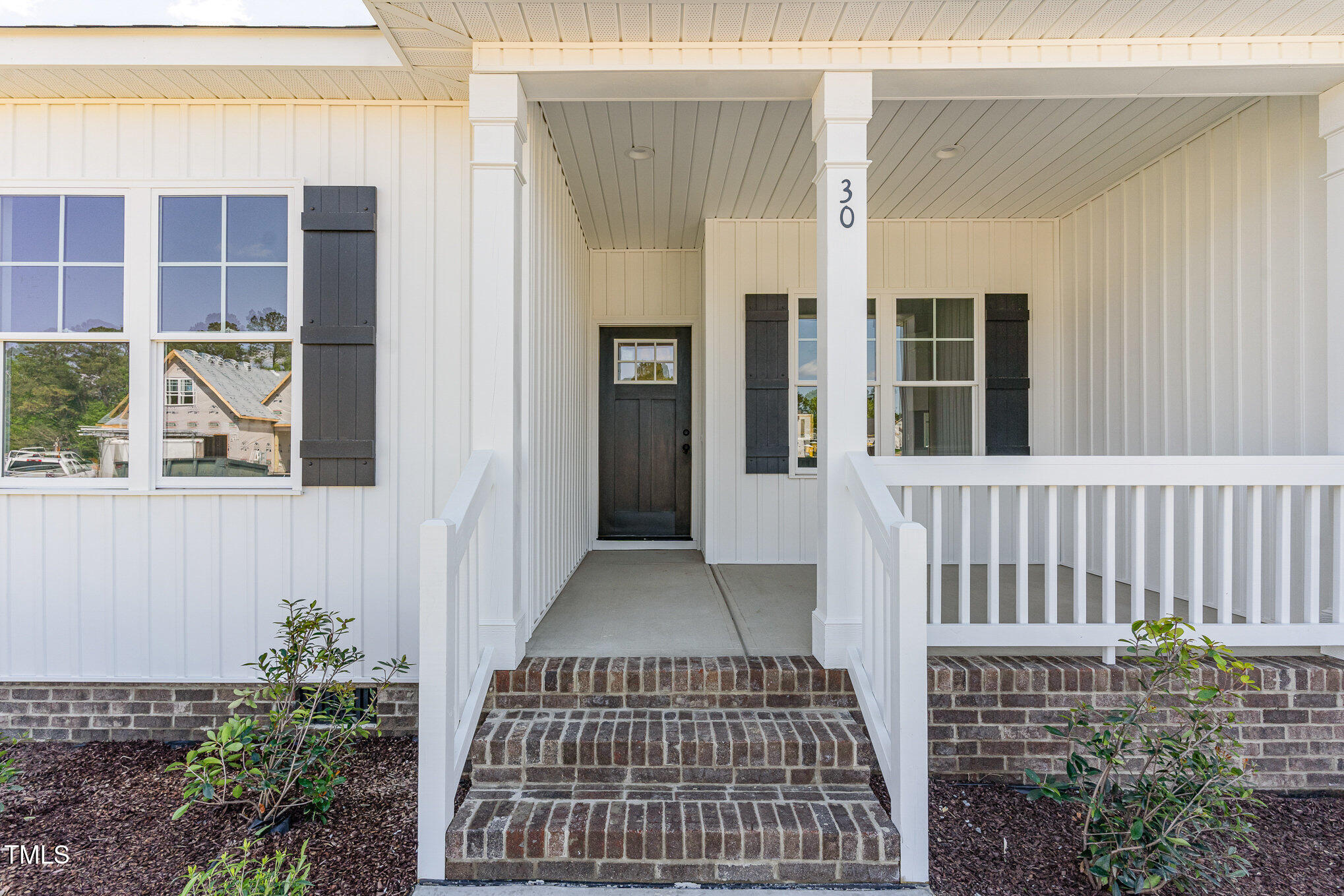 30 Tee Drive Selma, NC 27576 - Photo 4 of 28 a view of a house with a door and wooden floor