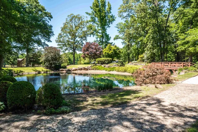 a view of a lake with a house