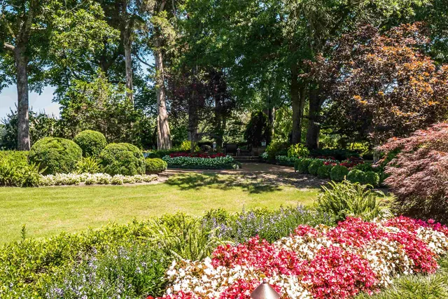 a view of a swimming pool with an outdoor space and seating area