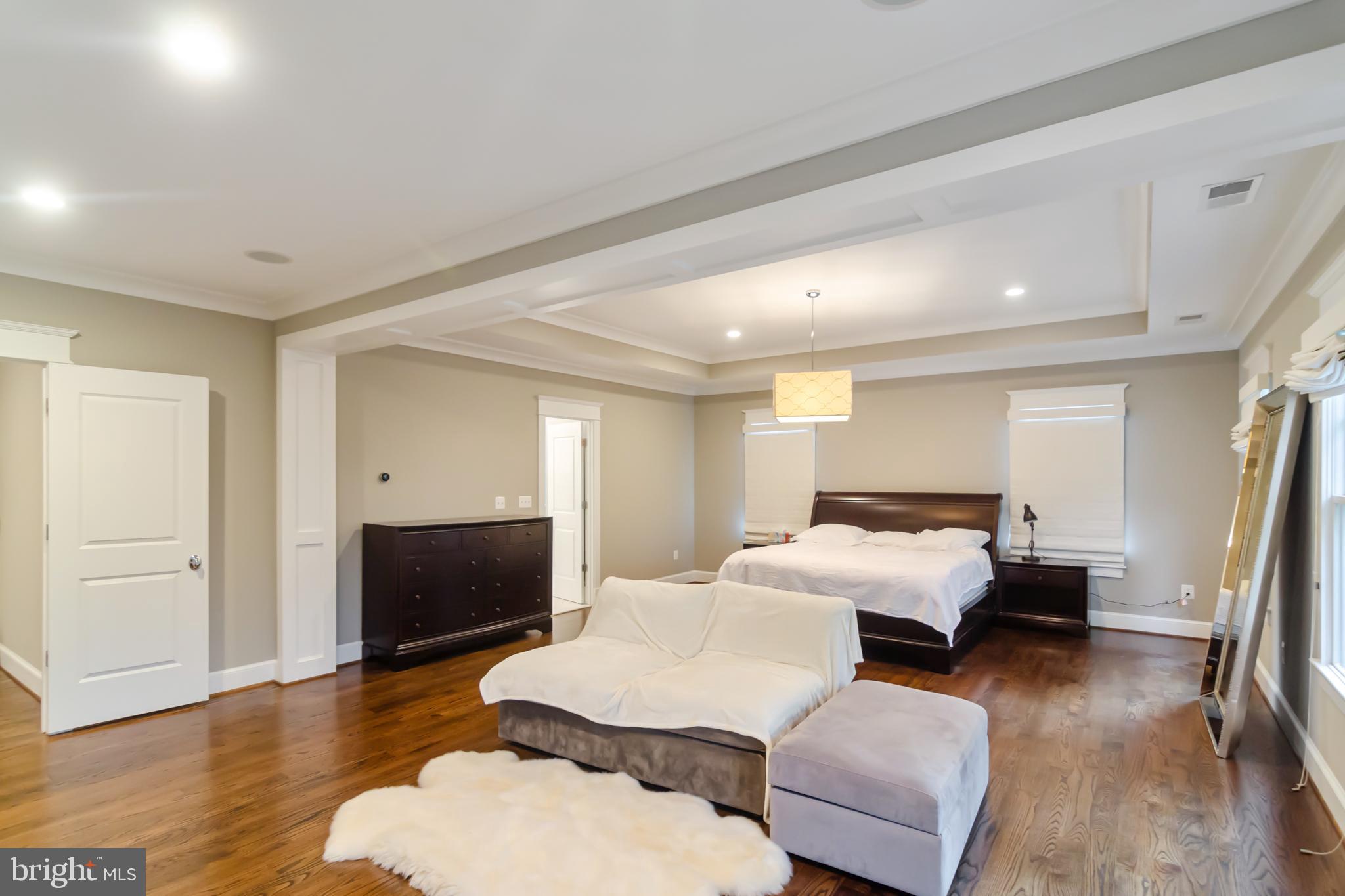 6801 Danforth Street McLean, VA 22101 - Photo 16 of 29 a bedroom with furniture and a wooden floor