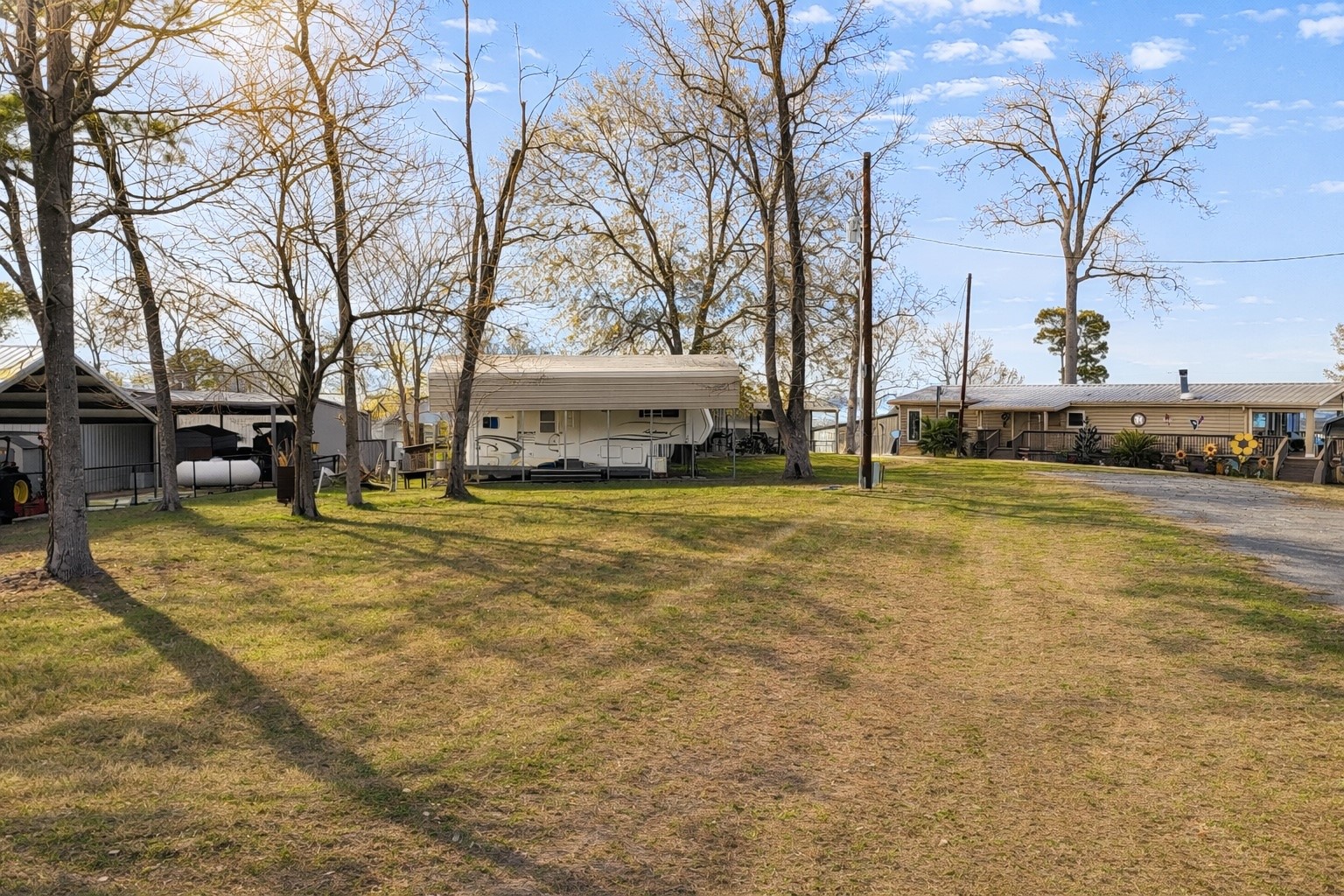 31 Kokomo Run Point Blank, TX 77364 - Photo 2 of 10 a swimming pool with trees in front of it