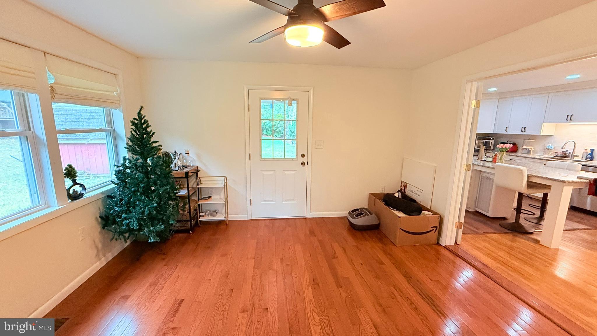 242 Spring Street State College, PA 16801 - Photo 20 of 75 a view of a room with wooden floor and a window