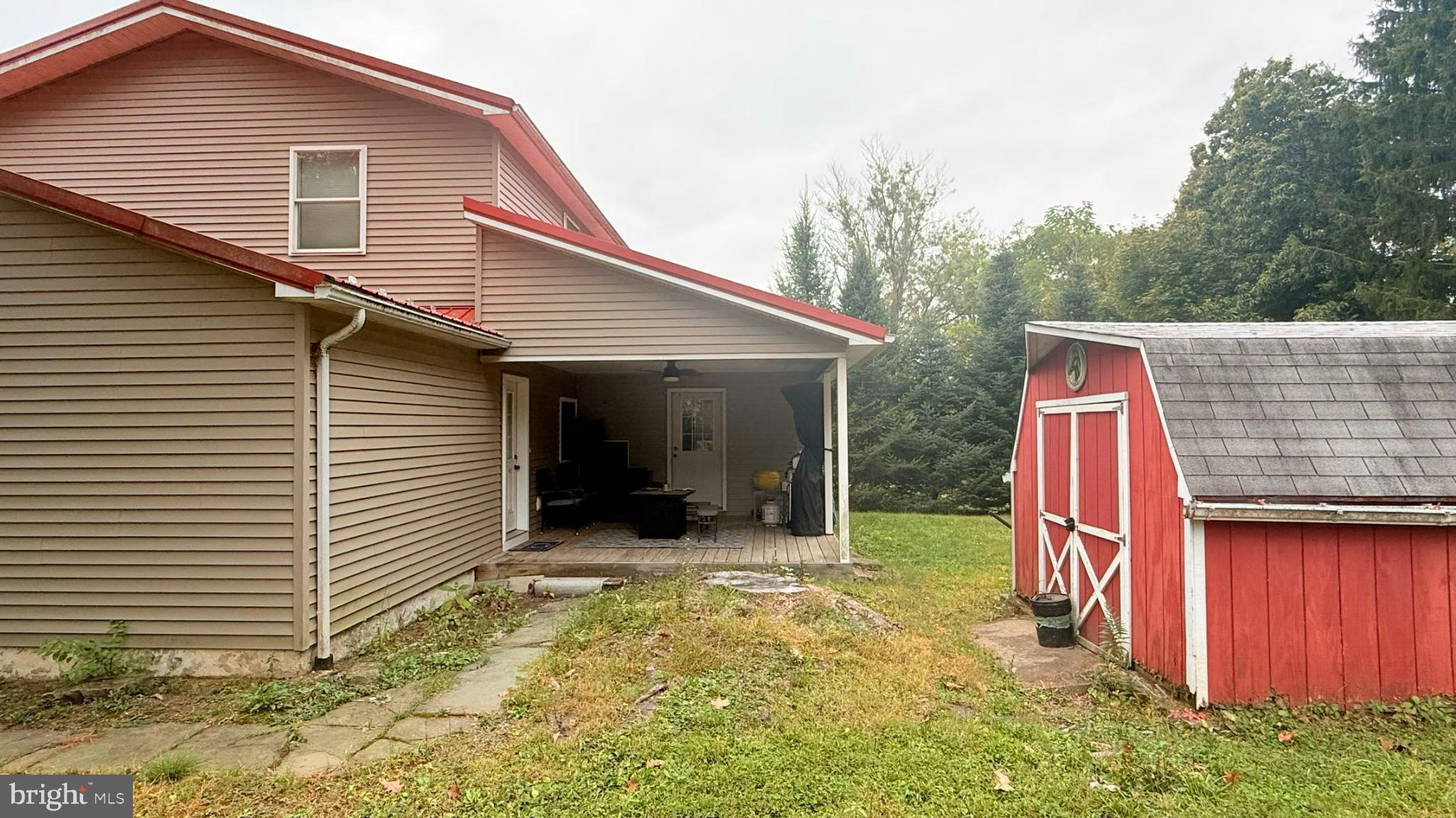 242 Spring Street State College, PA 16801 - Photo 3 of 75 Charming home with a vibrant red shed.