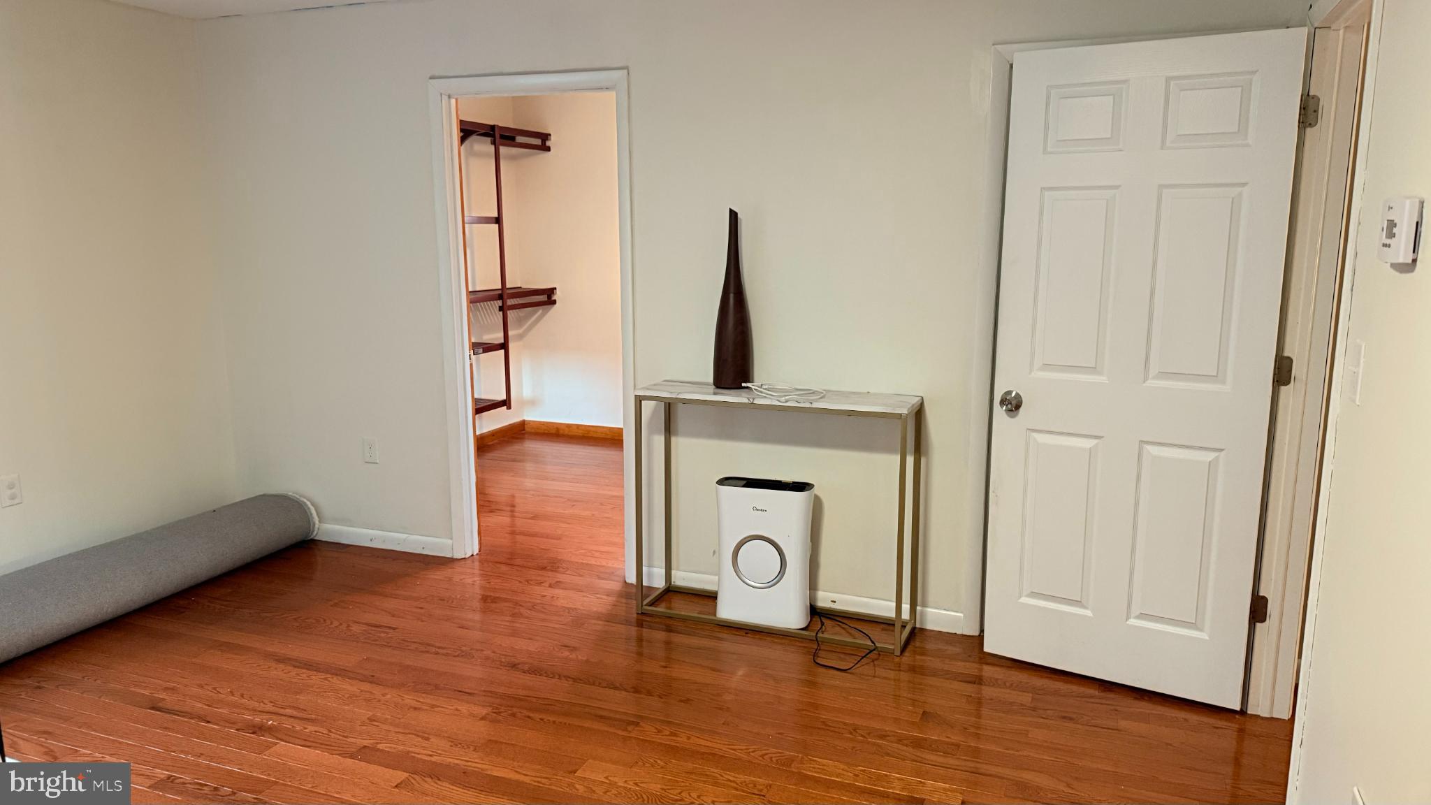 242 Spring Street State College, PA 16801 - Photo 51 of 75 a view of a hallway with wooden floor and staircase