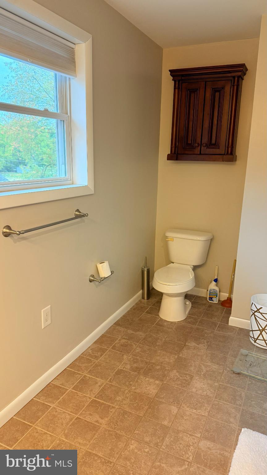 242 Spring Street State College, PA 16801 - Photo 58 of 75 a bathroom with a toilet