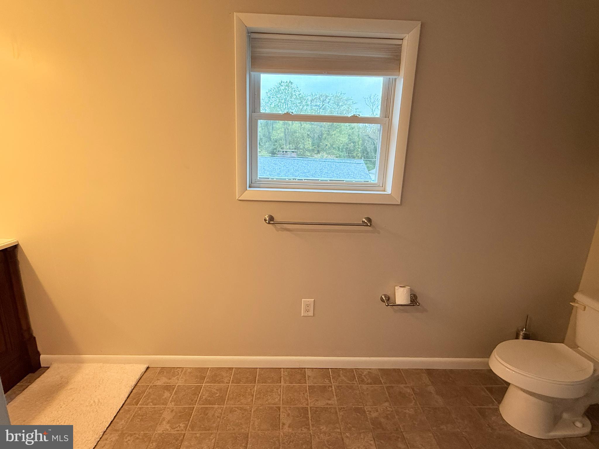 242 Spring Street State College, PA 16801 - Photo 60 of 75 a bathroom with a toilet and a shower