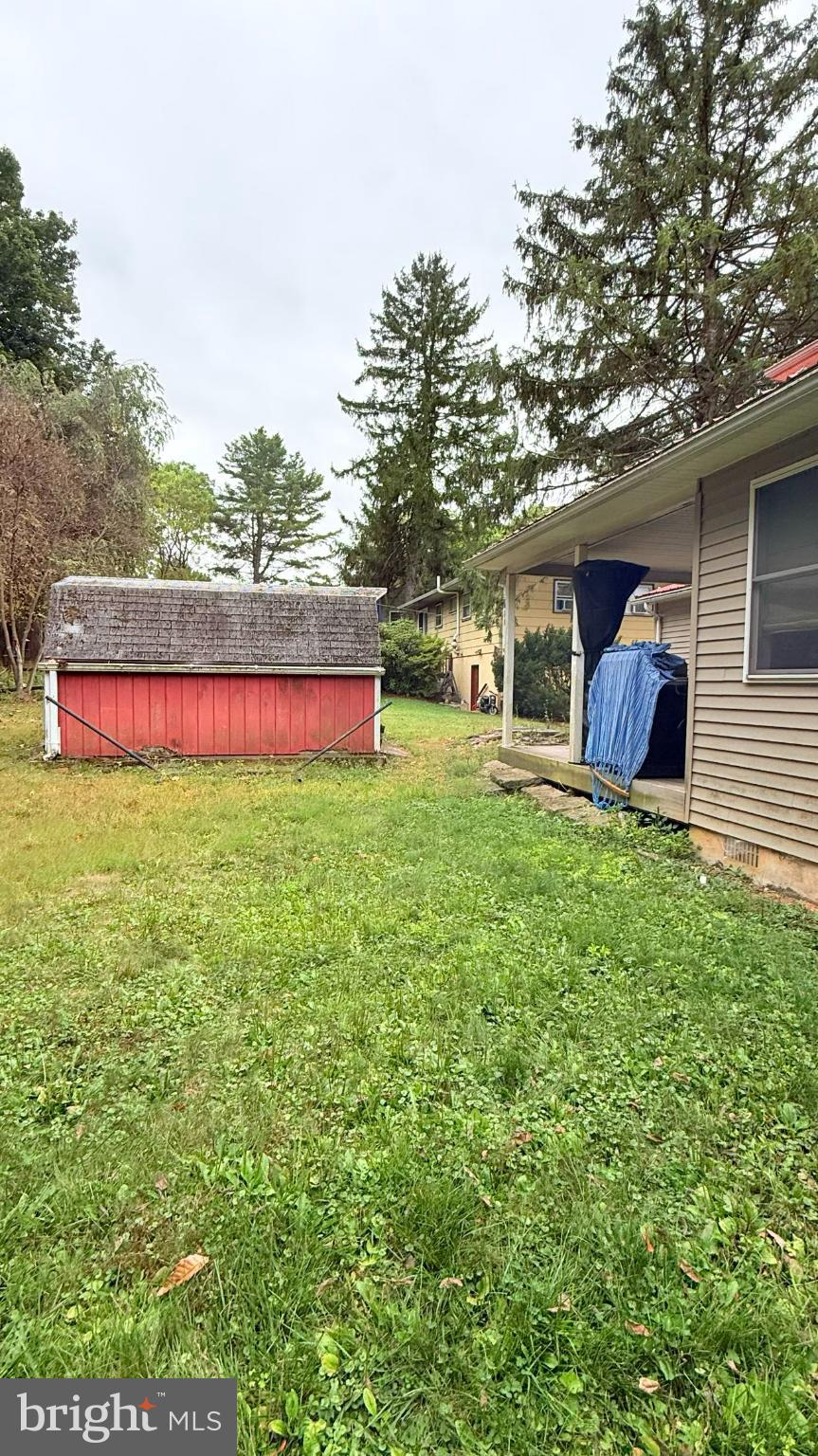 242 Spring Street State College, PA 16801 - Photo 6 of 75 a view of a house with a yard and sitting area