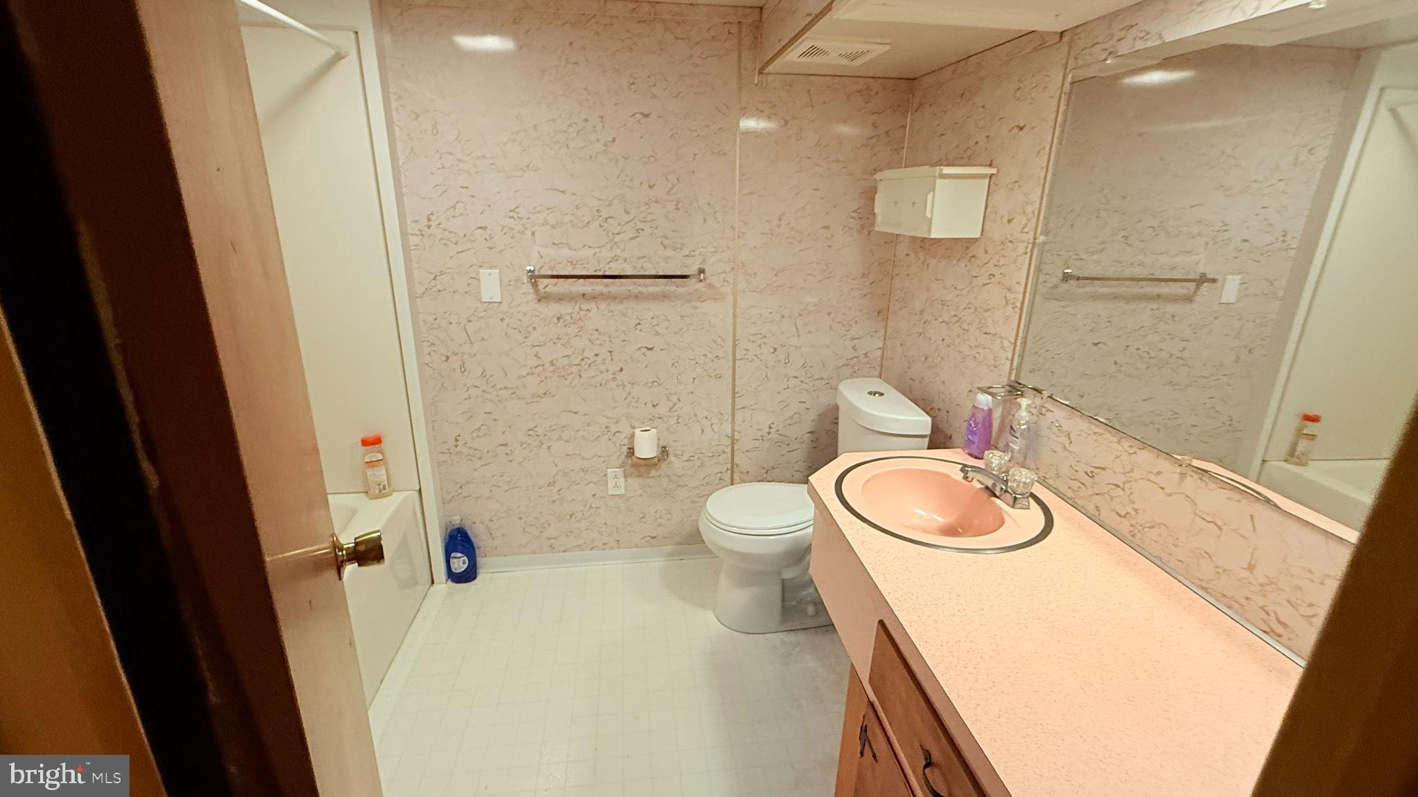 242 Spring Street State College, PA 16801 - Photo 68 of 75 a bathroom with a sink a toilet and shower