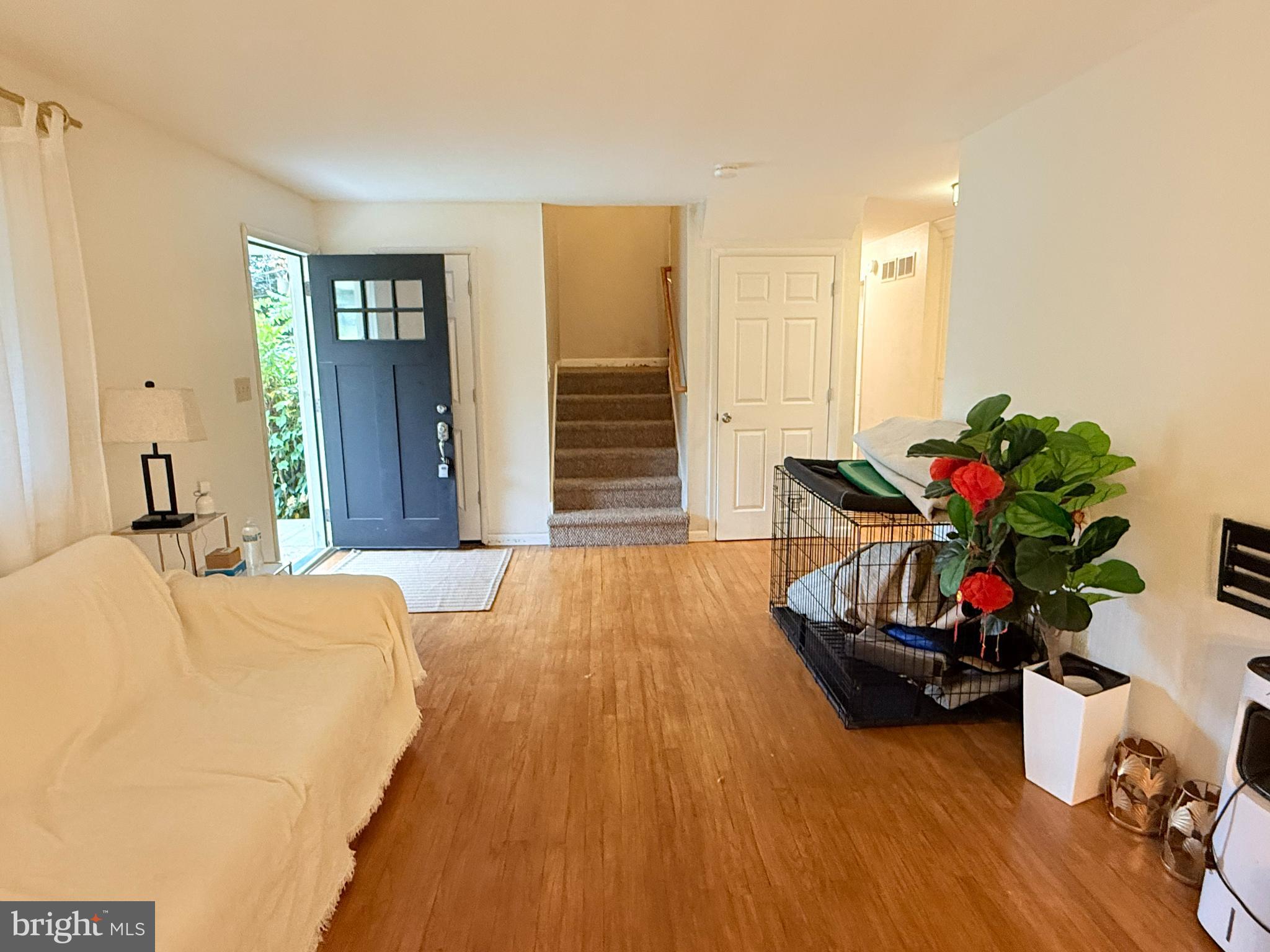 242 Spring Street State College, PA 16801 - Photo 10 of 75 a bed room with a bed and a chair