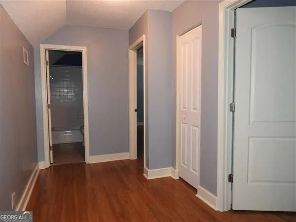 an empty room and wooden floor