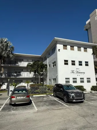 a car parked in front of a building
