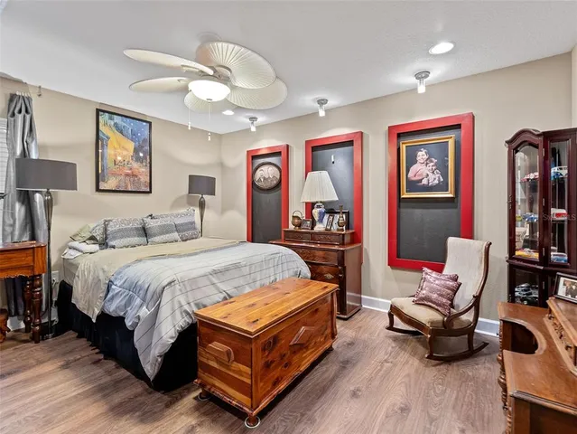 a view of a lake with houses in the back