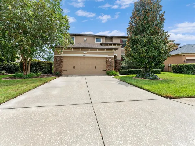 a view of a garden with houses