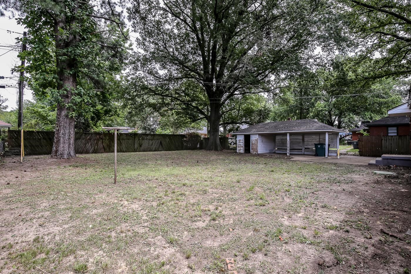 746 Waring Road Memphis, TN 38122 - Photo 15 of 16 View of yard with an outbuilding