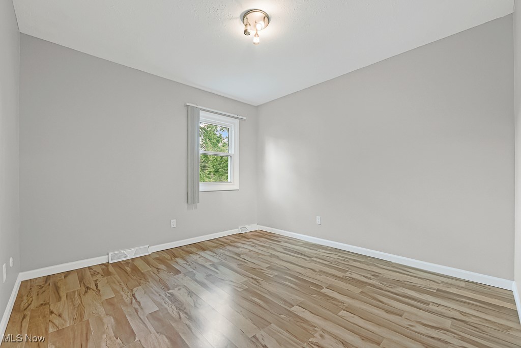 17682 Drake Road Strongsville, OH 44136 - Photo 23 of 45 Empty room featuring light wood-type flooring