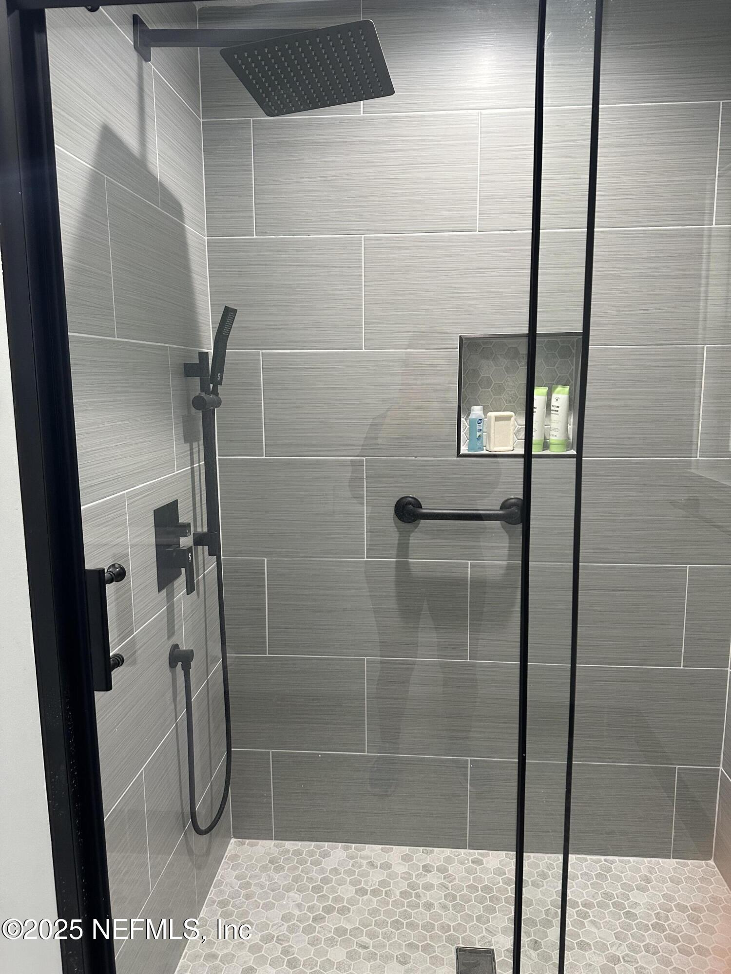 514 South 4th Street, Unit A Fernandina Beach, FL 32034 - Photo 8 of 13 a bathroom with a shower