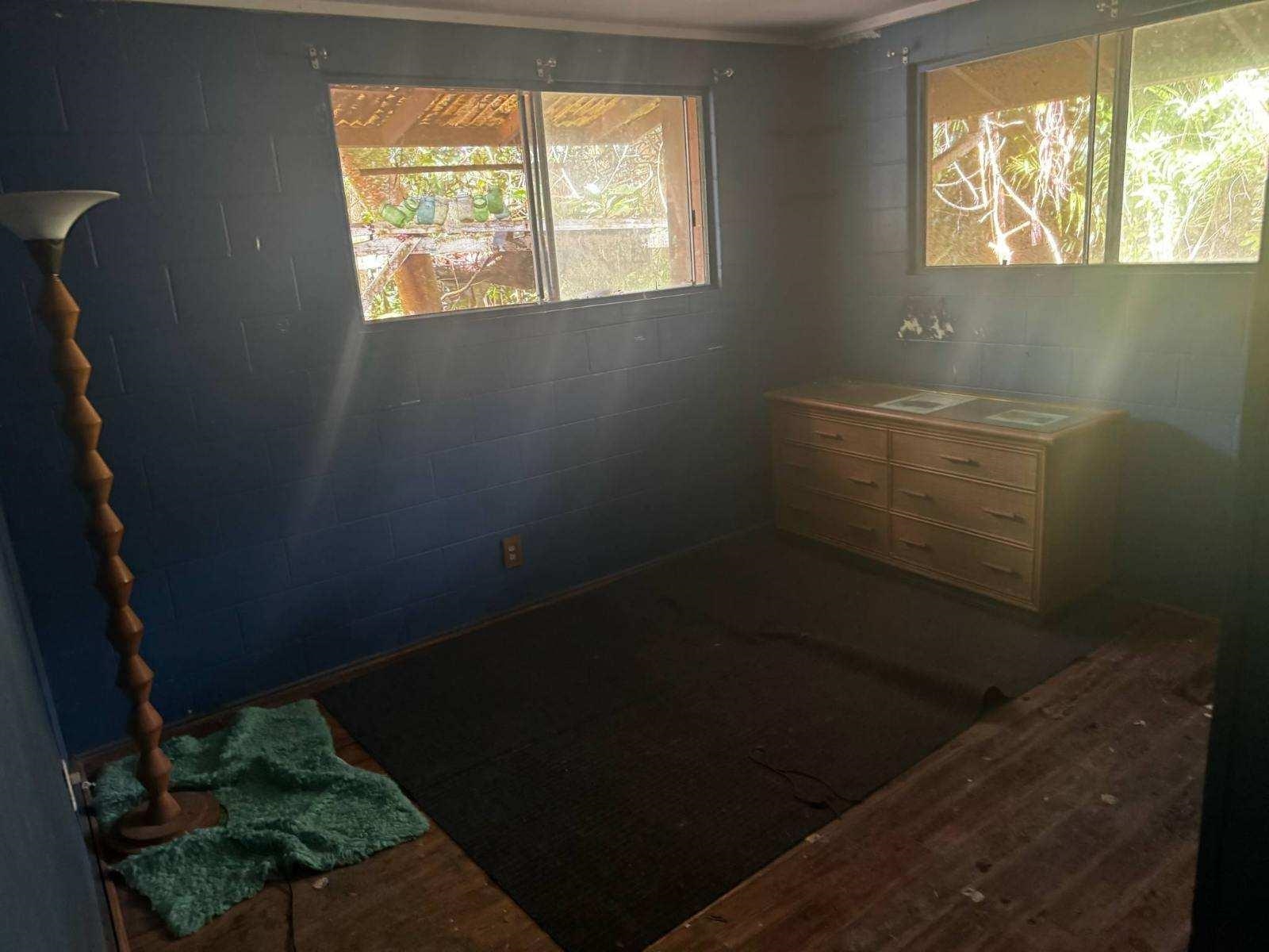 10 Honokaupu Place Haiku, HI 96708 - Photo 2 of 2 a bathroom with a window