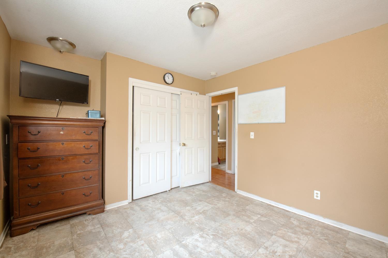 14531 West Kearney Boulevard Kerman, CA 93630 - Photo 21 of 22 a view of room with flat screen tv