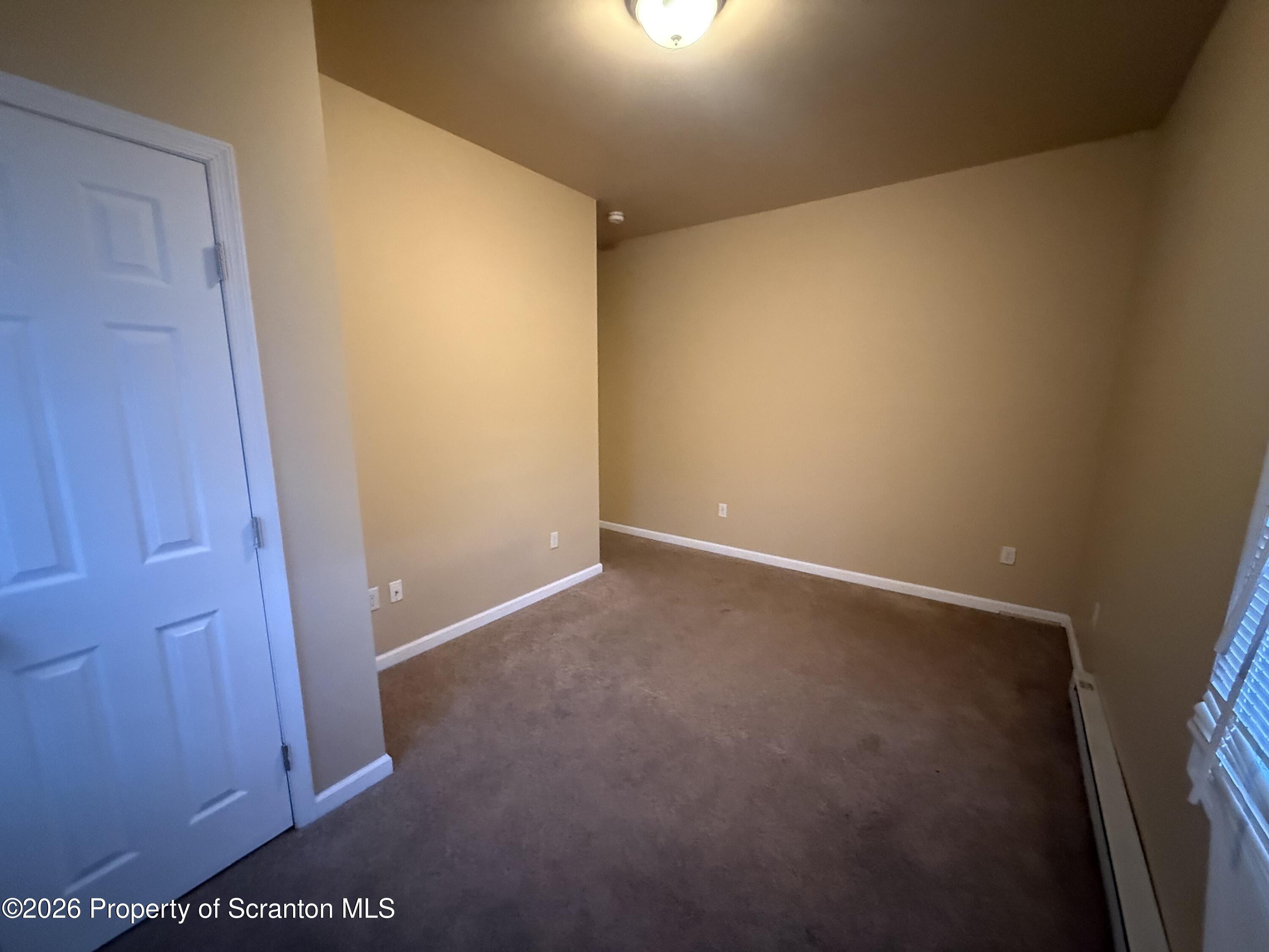 1409 Sanderson Avenue, Unit 2 Scranton, PA 18509 - Photo 5 of 9 an empty room