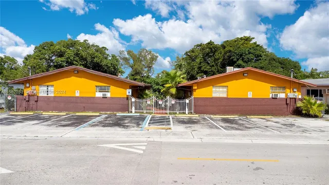 a view of swimming pool with a yard