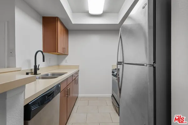 a kitchen with a stove and a microwave