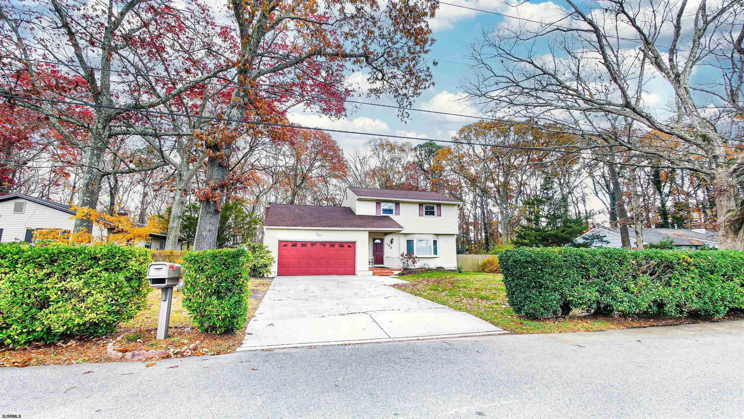 145 Webb Road Absecon, NJ 08201 - Photo 3 of 38 front view of a house with a street