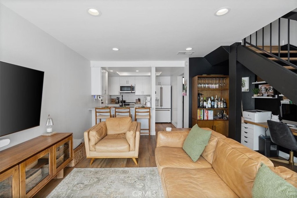 16873 Donwest Tustin, CA 92780 - Photo 2 of 42 a living room with furniture and a flat screen tv