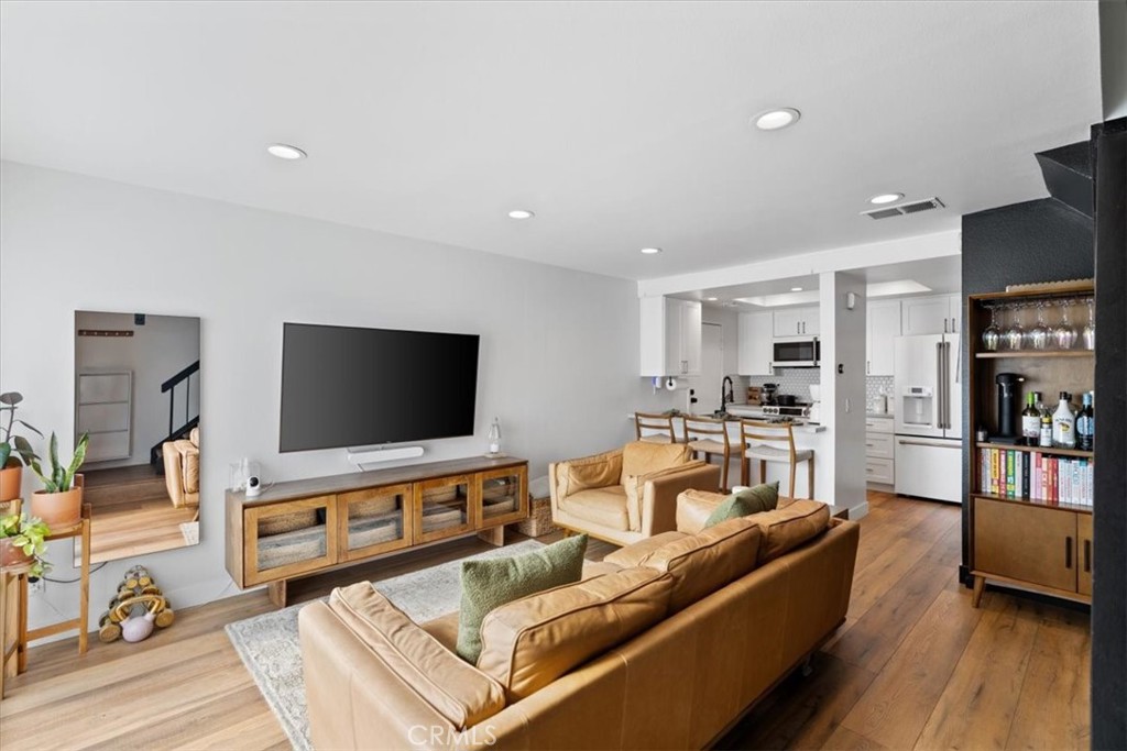 16873 Donwest Tustin, CA 92780 - Photo 3 of 42 a living room with furniture and a flat screen tv