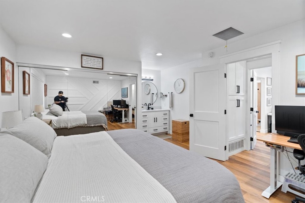 16873 Donwest Tustin, CA 92780 - Photo 34 of 42 a bedroom with furniture and a flat screen tv