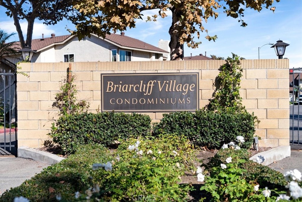 16873 Donwest Tustin, CA 92780 - Photo 37 of 42 a sign broad in front of flowers