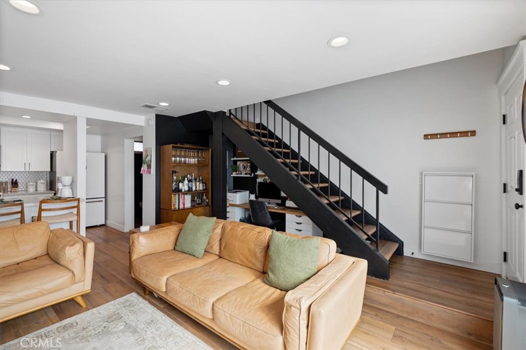 16873 Donwest Tustin, CA 92780 - Photo 4 of 42 a living room with furniture or wooden floor and a potted plant